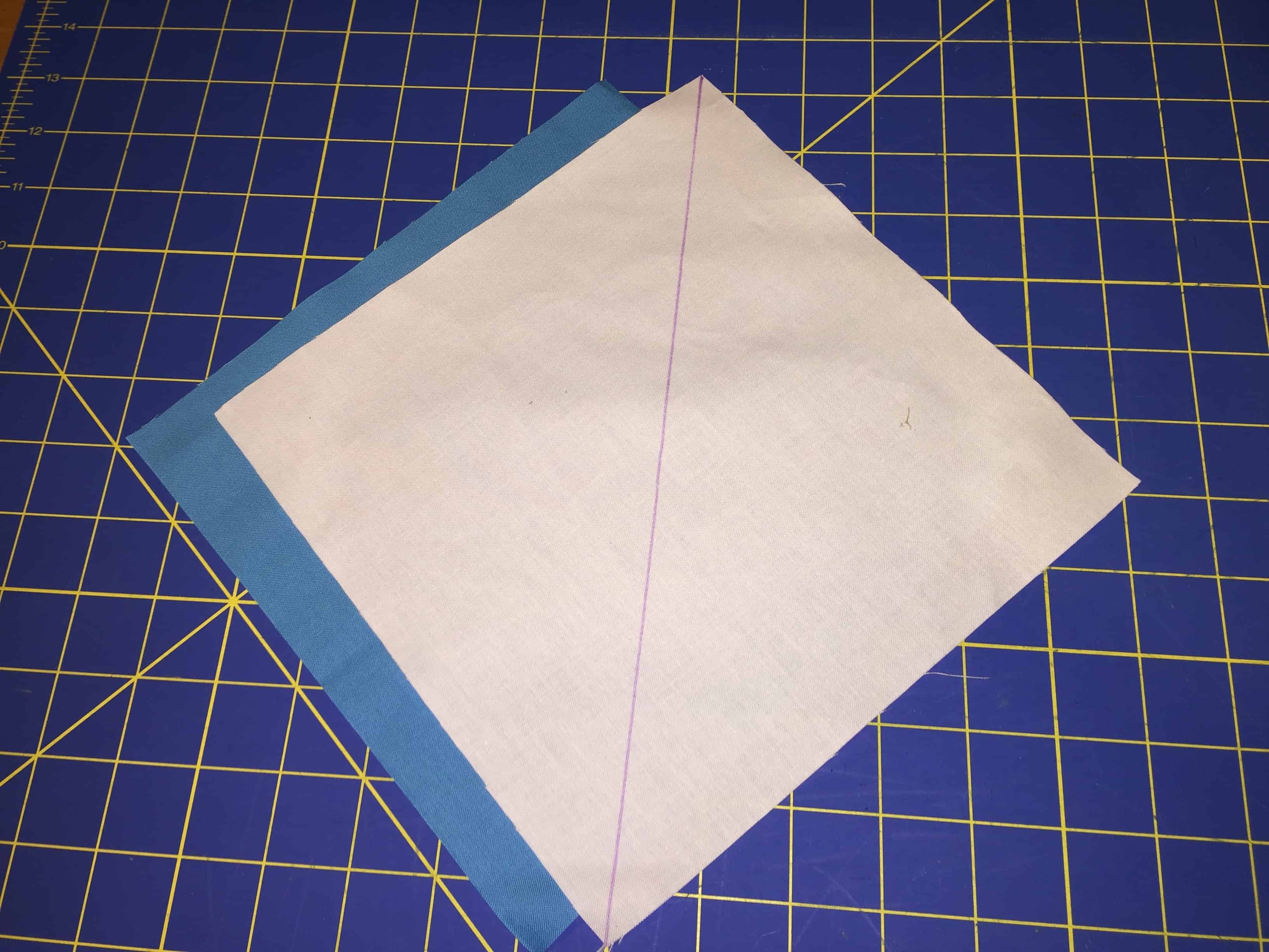 Create a half square triangle (HST) from two 8.5" squarea